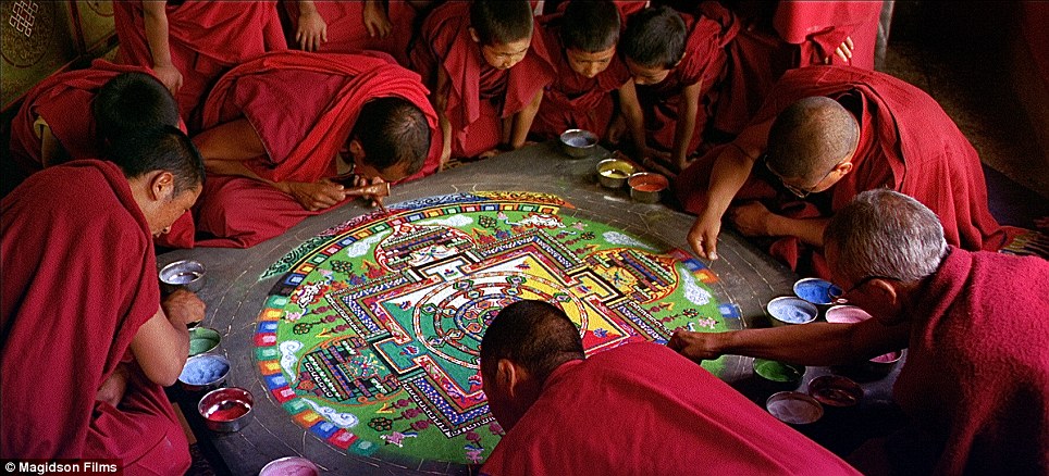 Meticulous: Young monks observed the more seasoned making a Sand Mandala in Ladakh, India