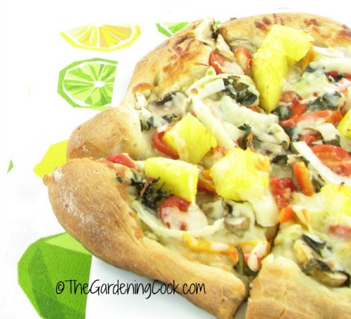 vegetarian pizza with pineapple and fresh basil