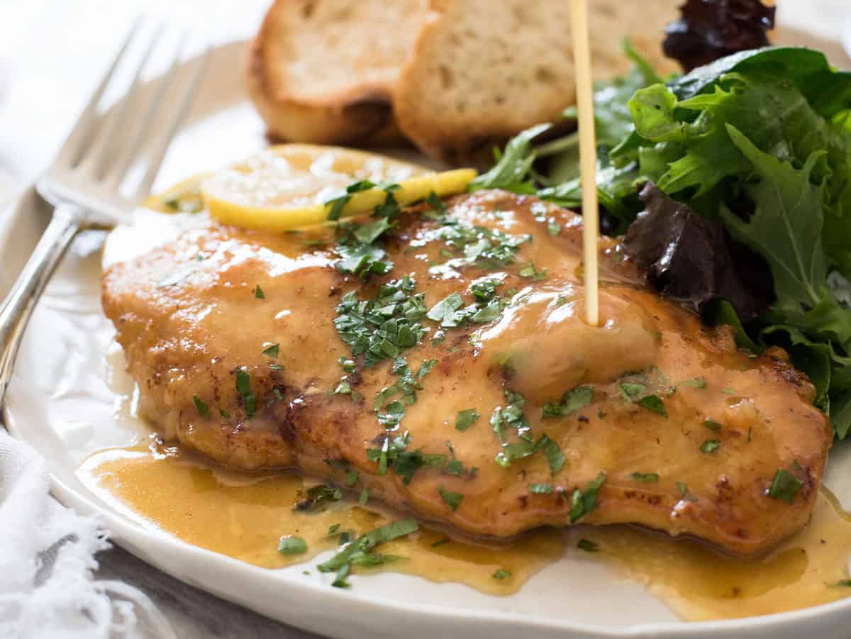 Honey Lemon Chicken - Golden brown chicken breast with a gorgeous honey lemon sauce. On the table in 15 minutes! recipetineats.com